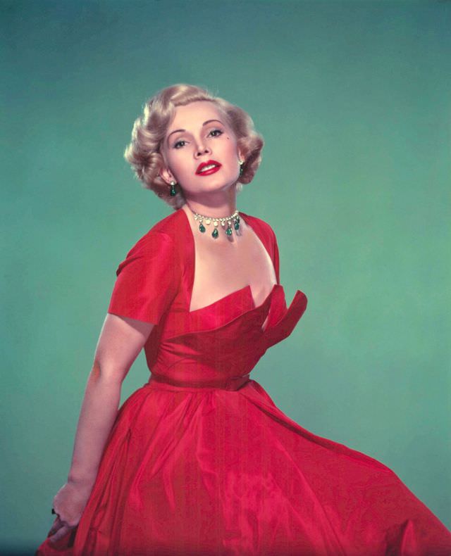 #25 Zsa Zsa Gabor in red taffeta dress