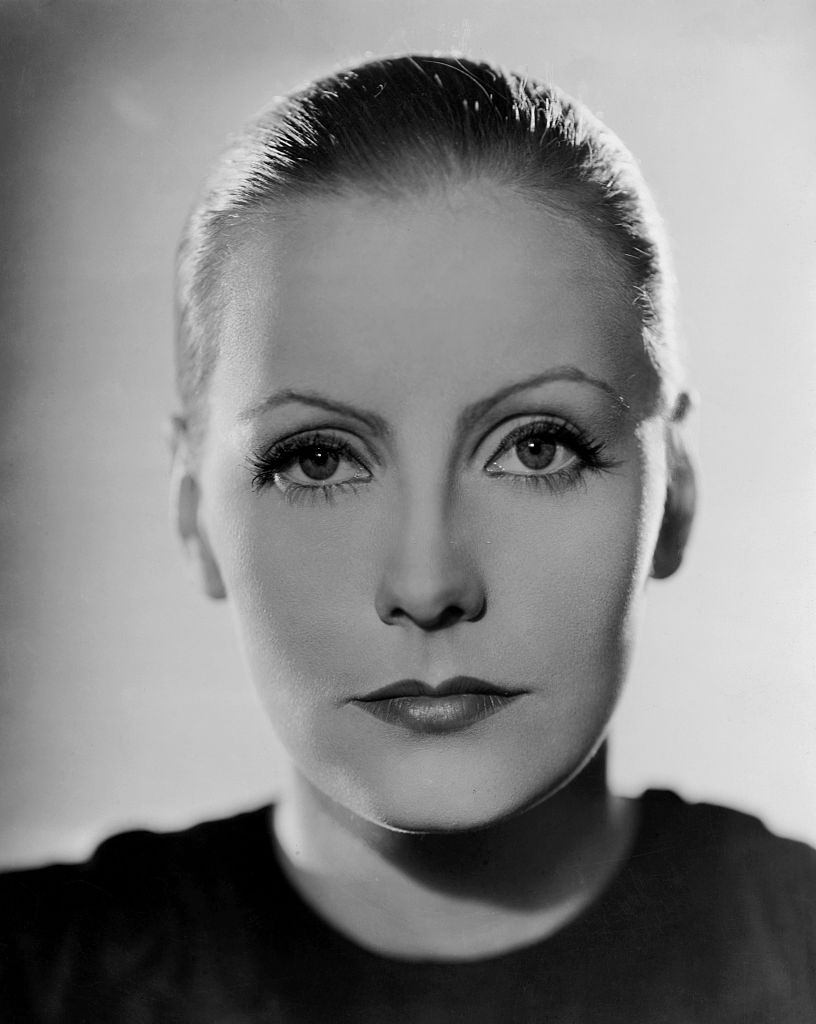 #17 Actress Greta Garbo during a photoshoot, 1931.