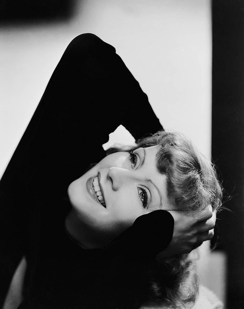 #22 Greta Garbo in black dress, 1927.