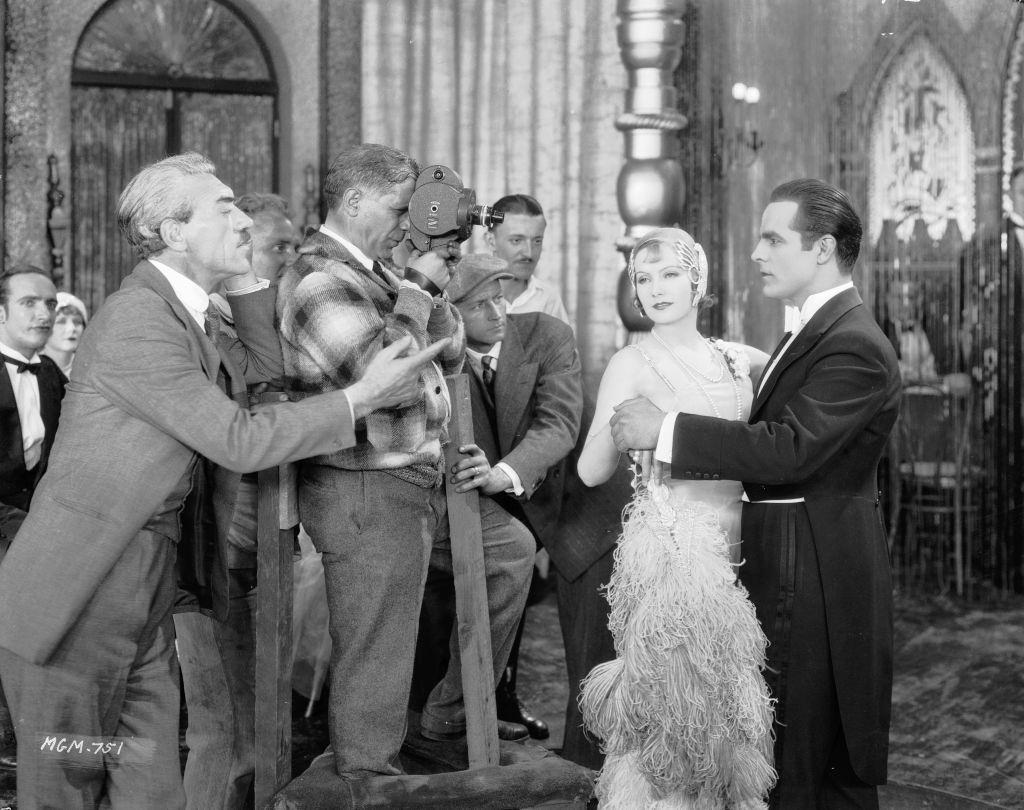 #28 Greta Garbo dancing with film director Mauritz Stiller, 1926.