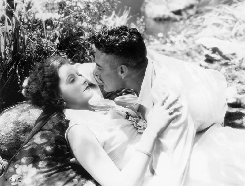 #48 Greta Garbo with John Gilbert on the set of ‘Love,’ 1927.