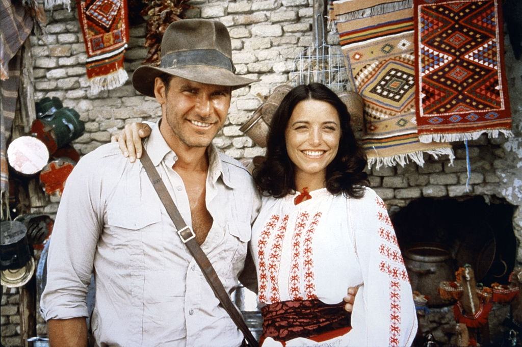 #15 Karen Allen with Harrison Ford on the set of “Raiders of the Lost Ark”.