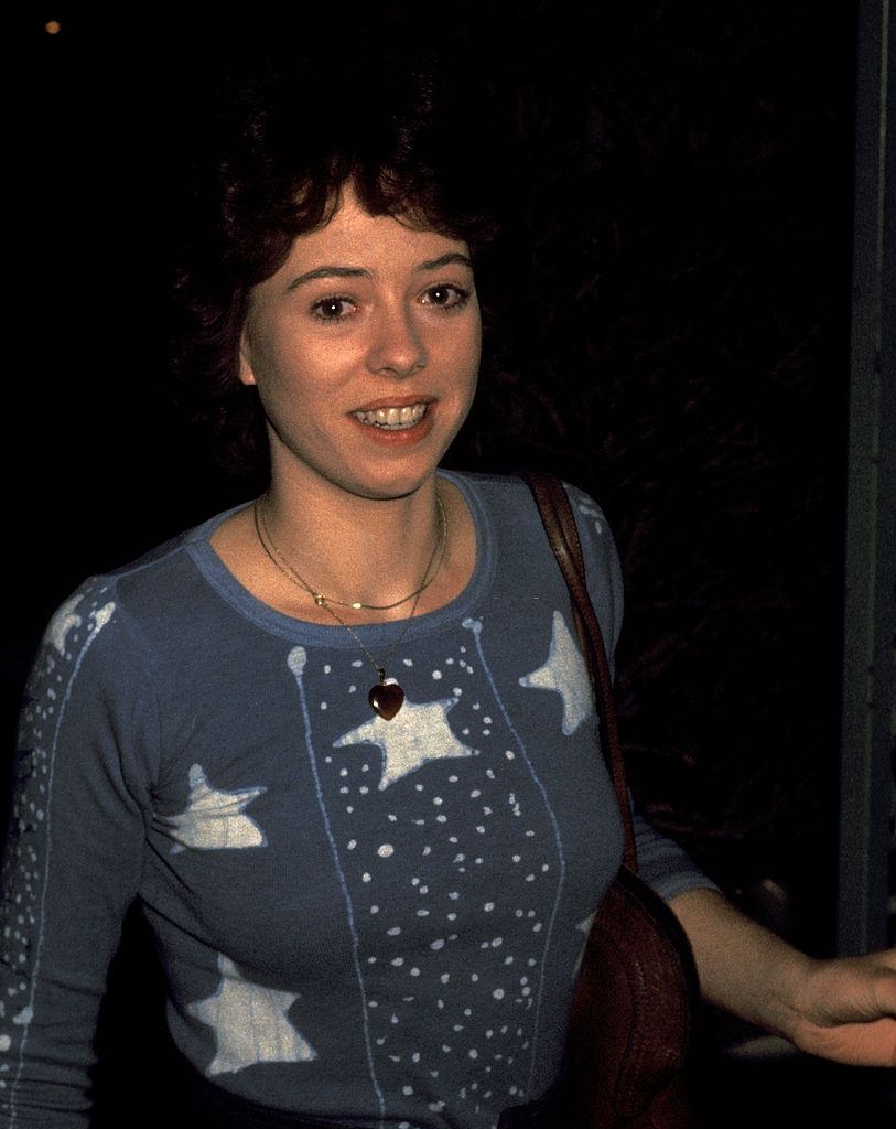 #7 Mackenzie Phillips arriving at a party, 1977.