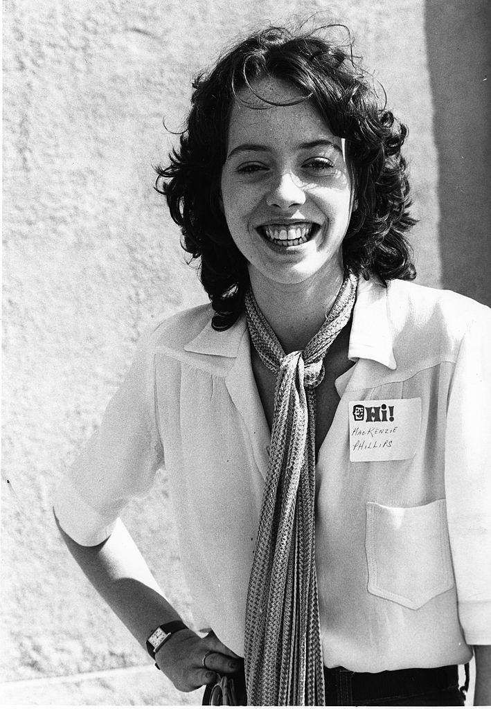 #25 Mackenzie Phillips at an event wearing a name tage in 1979.