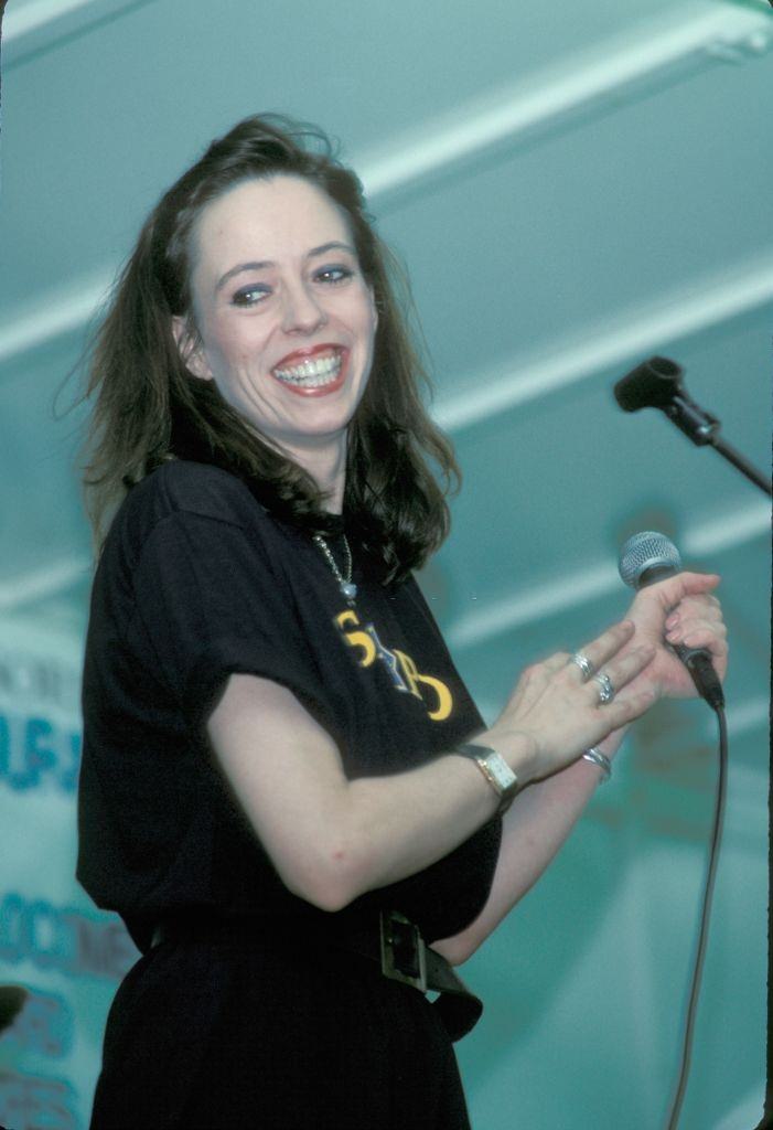 #35 Mackenzie Phillips Performing in a concert, 1990.