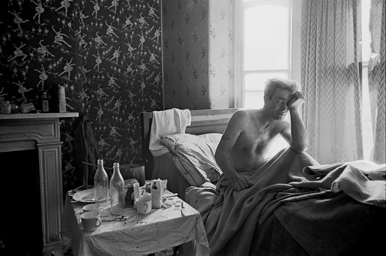 #8 Single man living in one room of multi let house, Moss Side 1969