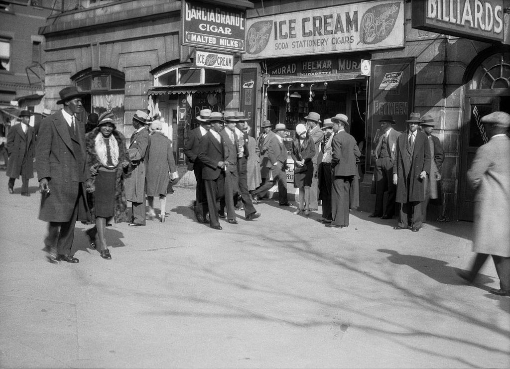 #27 Pedestrians on Harlem Sidewalk, New York City, 1930.