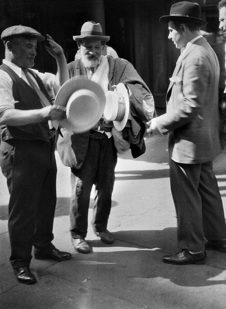 #34 A Jewish hat merchant on the Lower East Side, New York City, 1930s.