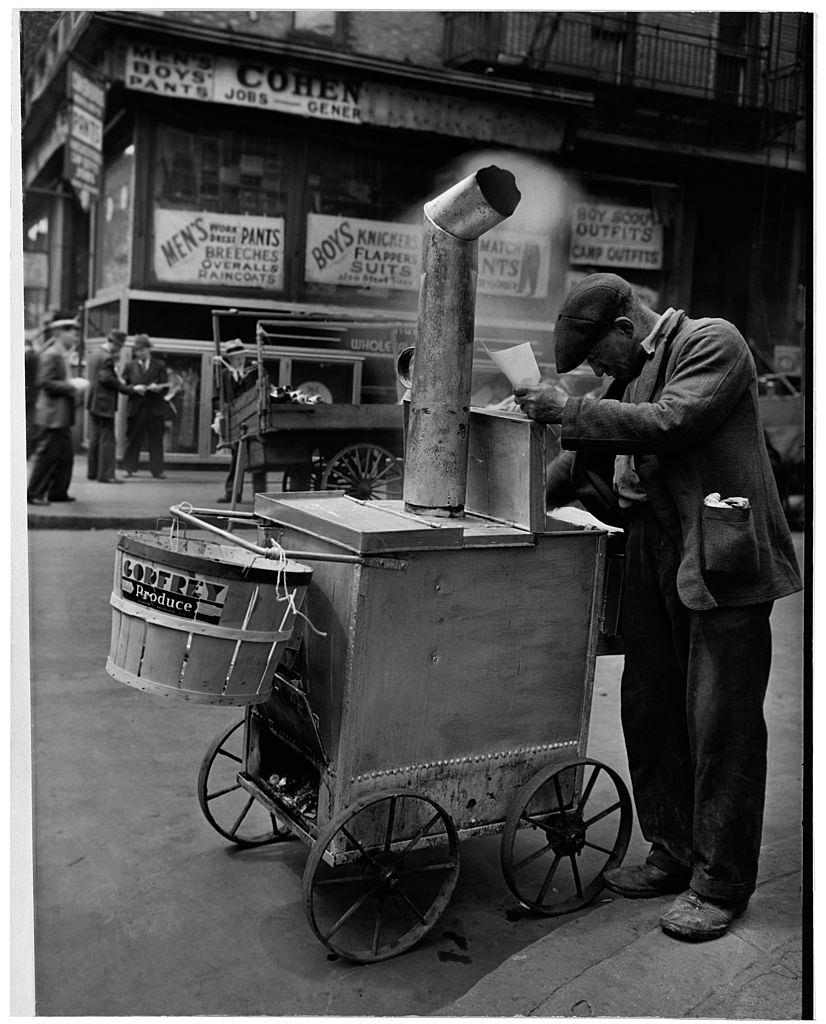 #4 A man selling roast corn, New York City, 1938.