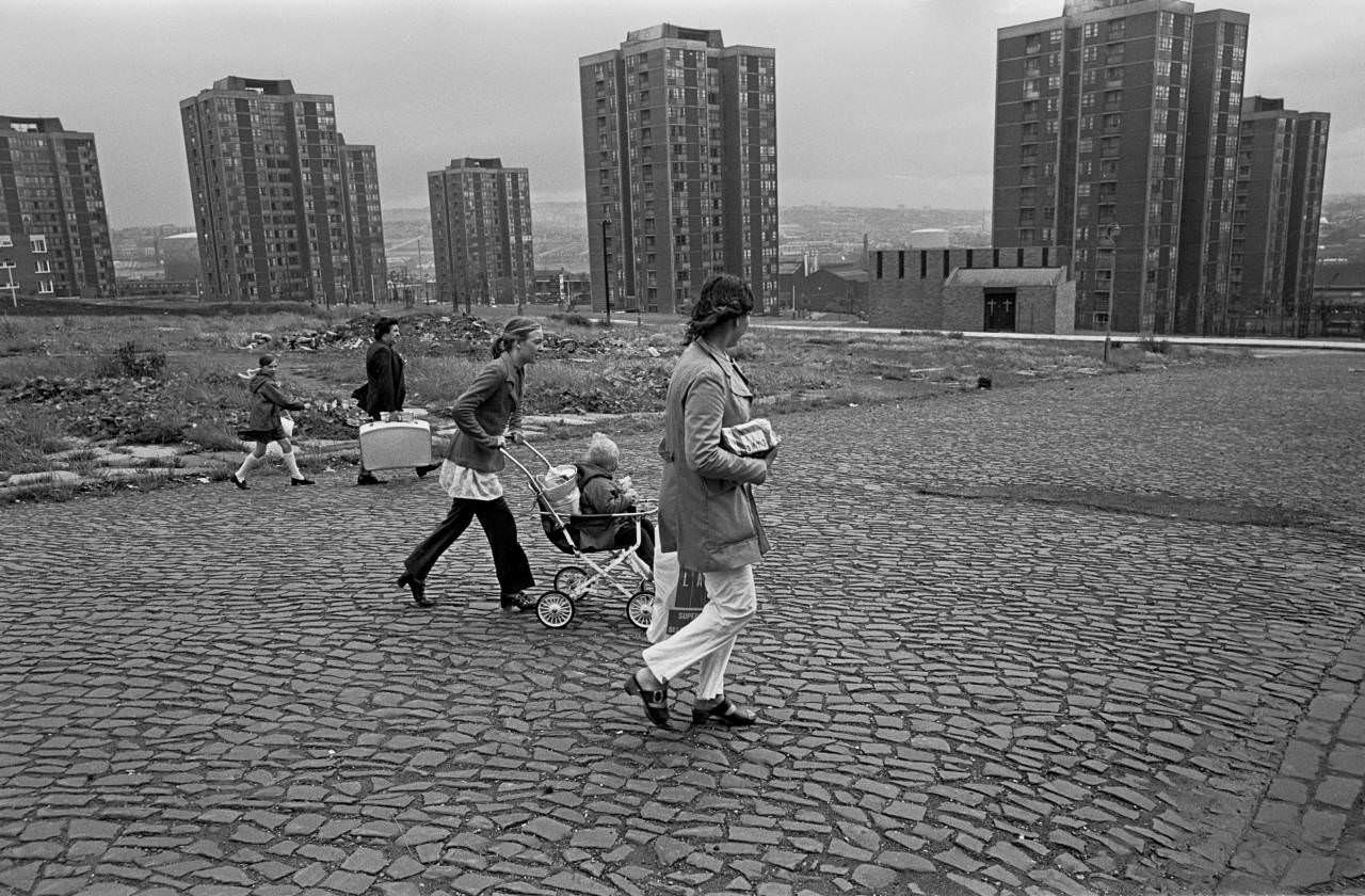 #3 Families wlking across slum clearance site Newcastle upon Tyne 1972