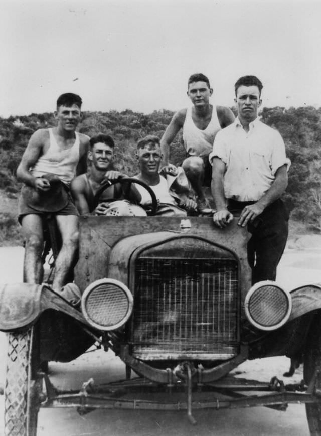 #26 Group of mates riding in a Model T Ford, Double Island Point, Queensland