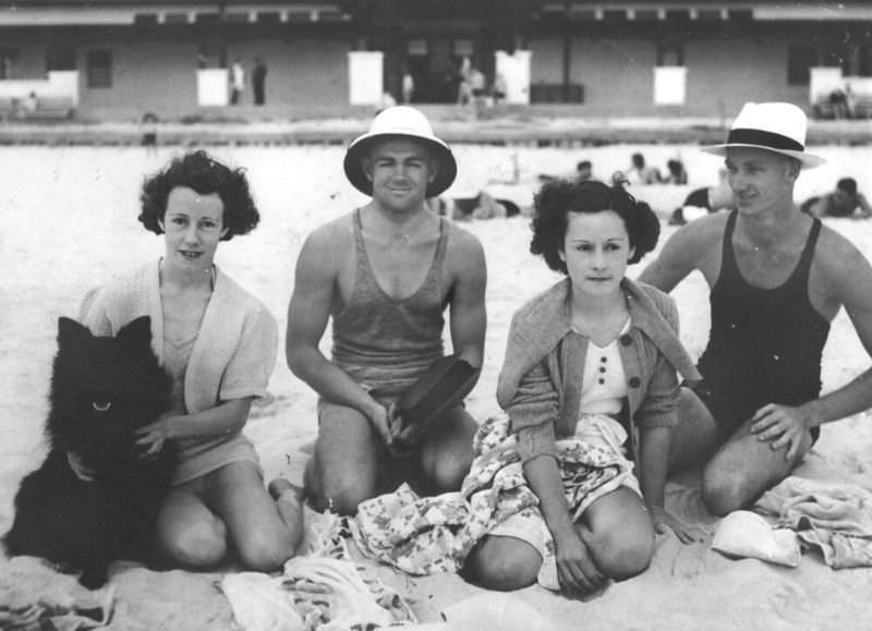#27 Group of young people enjoying a day at the beach with their dog, Queensland