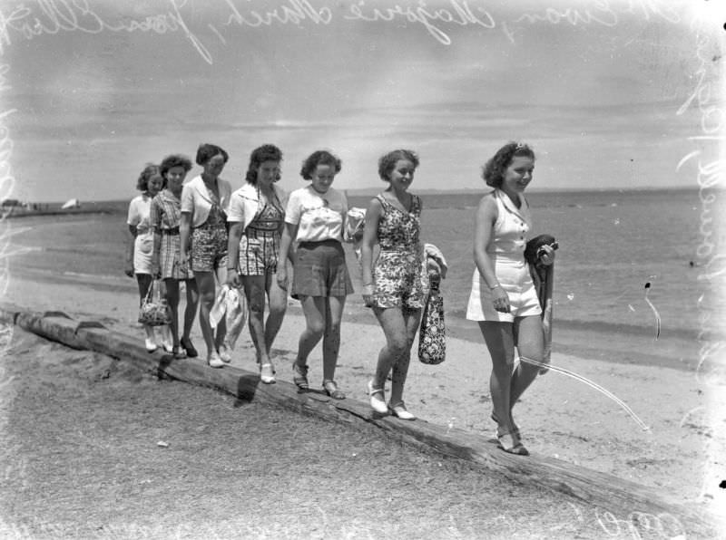 #47 Young women taking a walk along the beach, Queensland