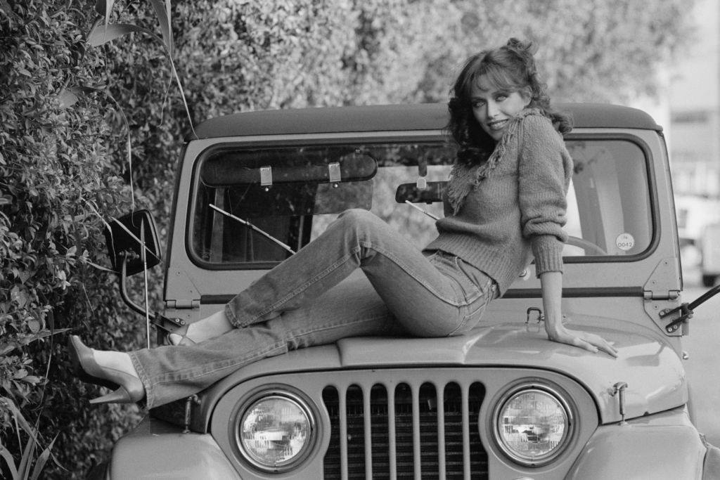 #14 Tanya Roberts posing on the car, 1981.
