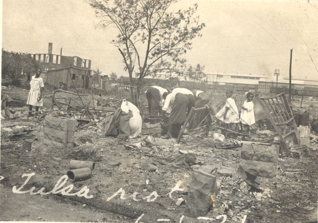 #21 People searching through rubble after the Tulsa Race Massacre, June 1921.
