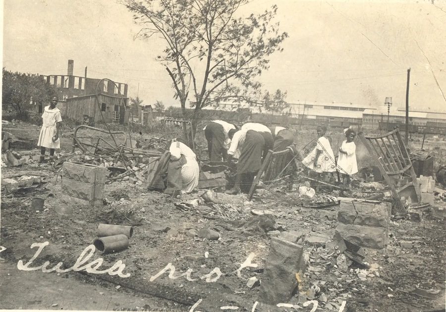 #30 People search through rubble after the Tulsa massacre in June 1921.