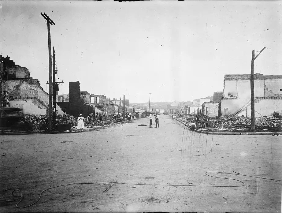 #8 Tulsa’s Greenwood District is left in ruins on June 1, 1921.
