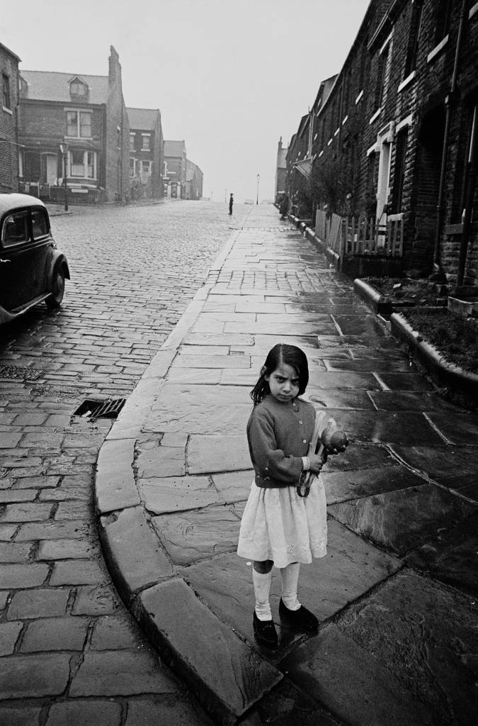 #20 Girl playing on a Bradford street corner, 1969