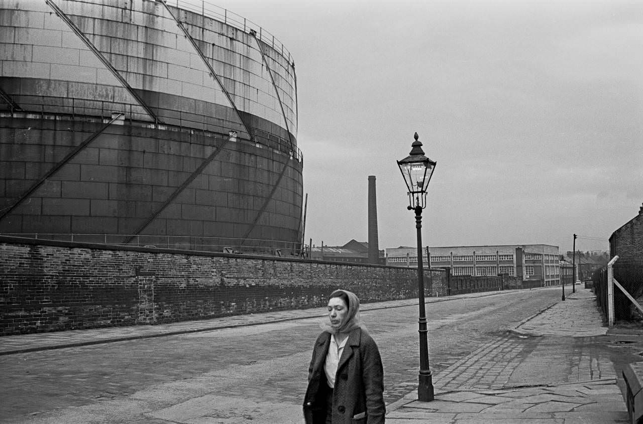 #25 Street scene by gas works, Bradford, 1969