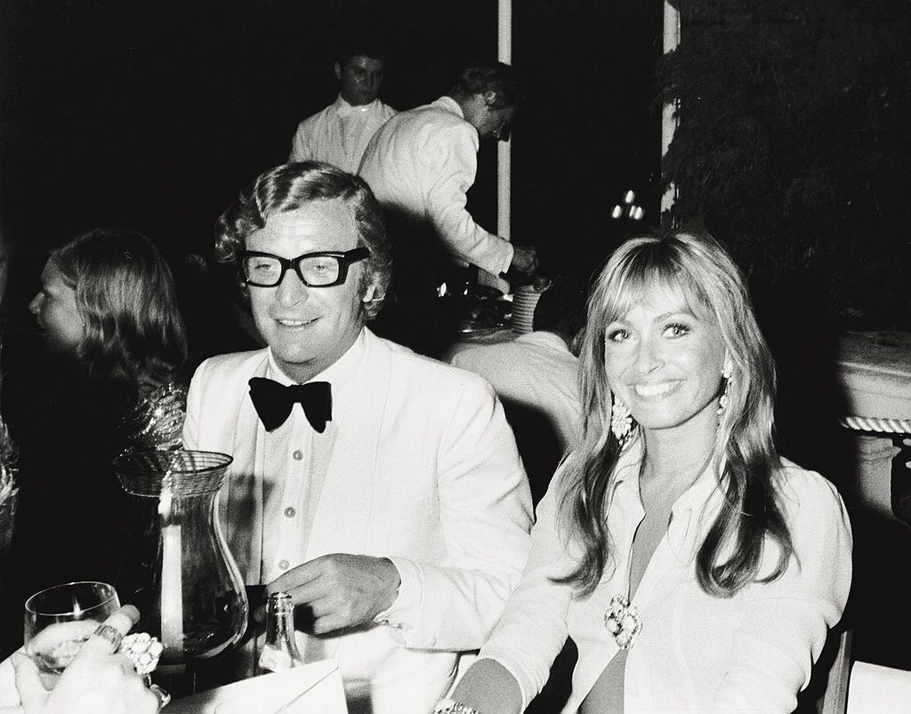 #13 Michael Caine with Suzy Kendall at the Red Cross Gala Dinnner, 1971.