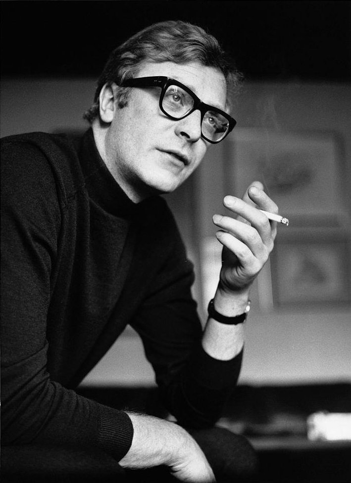 #14 Michael Caine smoking a cigarette, 1965.