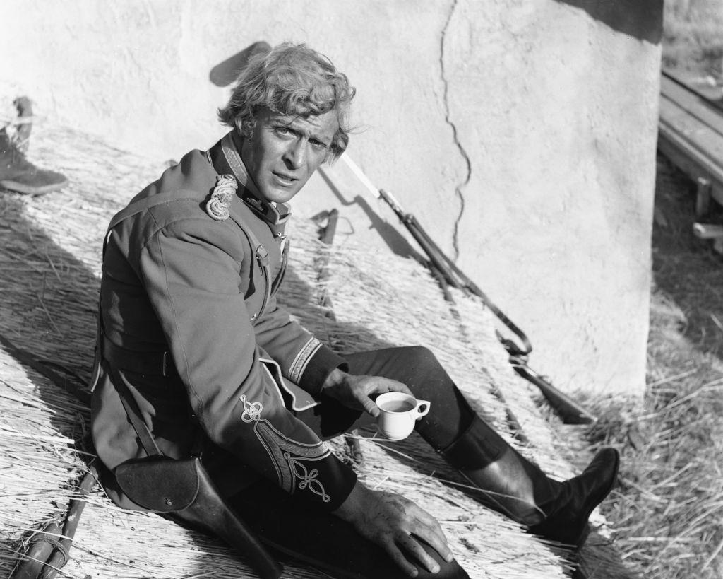 #15 Michael Caine takes a tea break on the set of ‘Zulu’, 1964.