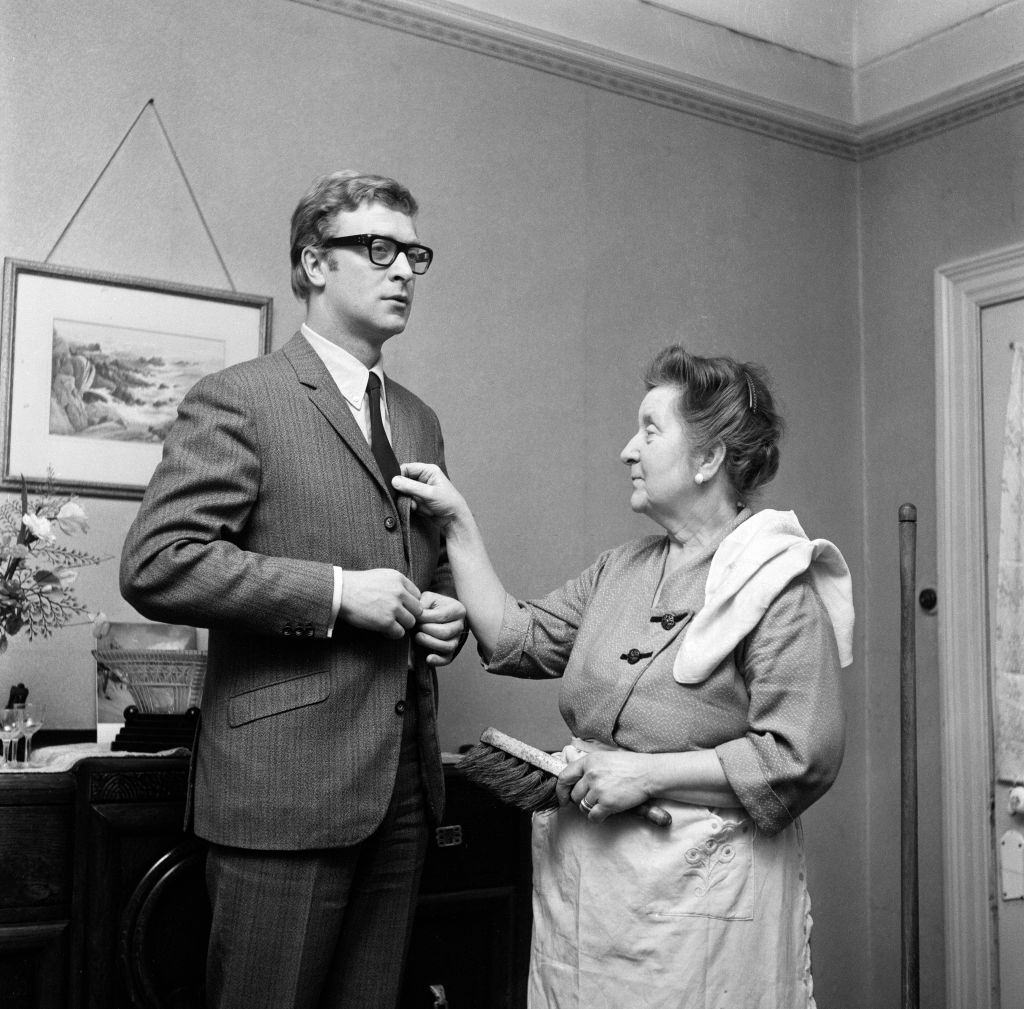 #21 Michael Caine at home with his mother, Ellen Maria Burchell, 1964.