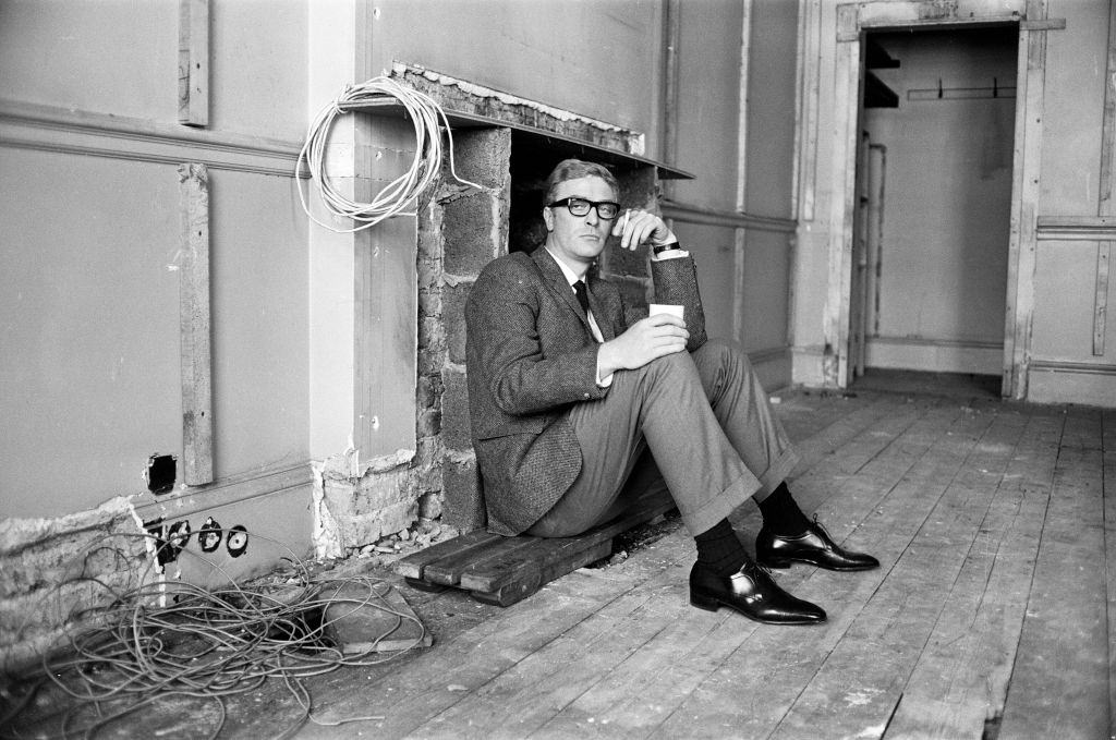 #23 Michael Caine on the set of ‘The Ipcress File’, 21st September 1964.