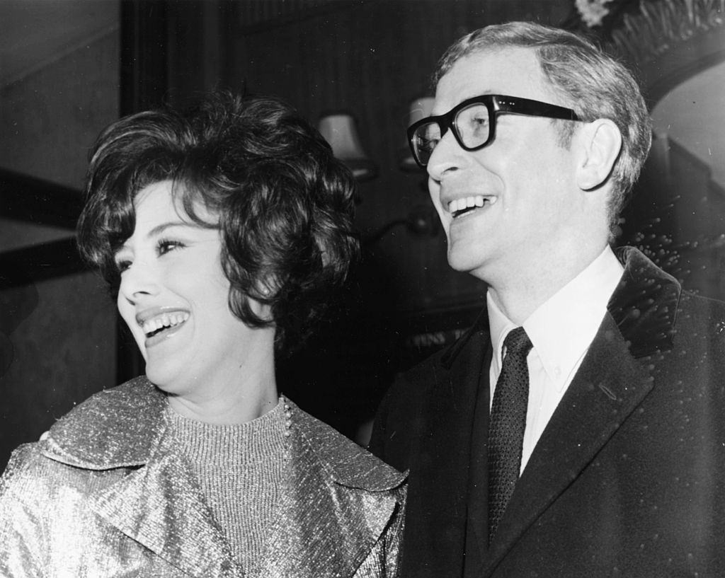 #33 Michael Caine with Sue Lloyd, 1965.