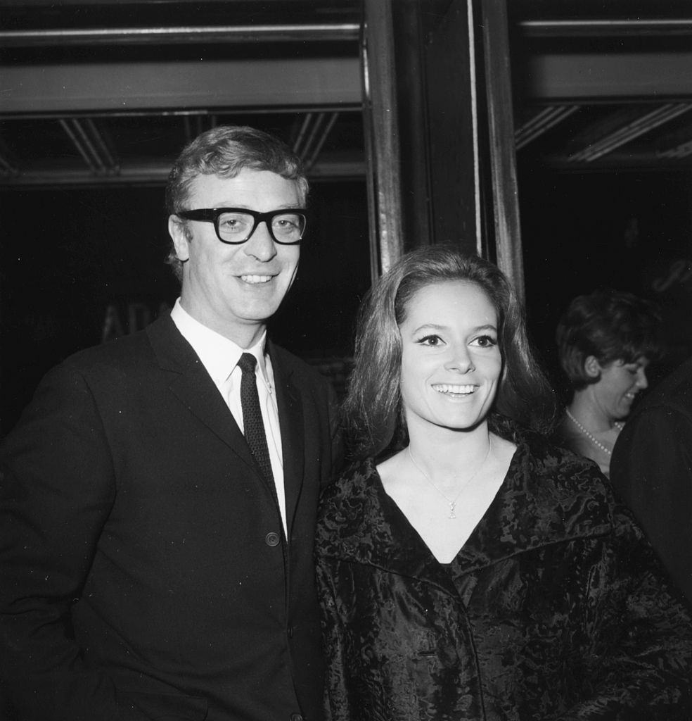 #36 Michael Caine with Luciana Paluzzi at the premiere of the film ‘Repulsion’, 1965.