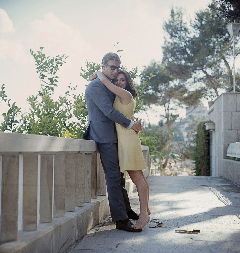 #54 Michael Caine with actress Giovanna Ralli in the film ‘Deadfall’, 1968.