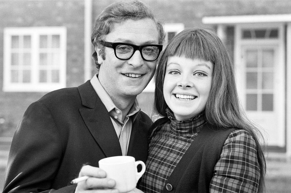 #57 Michael Caine with actress Anna Calder-Marshall, 1968.