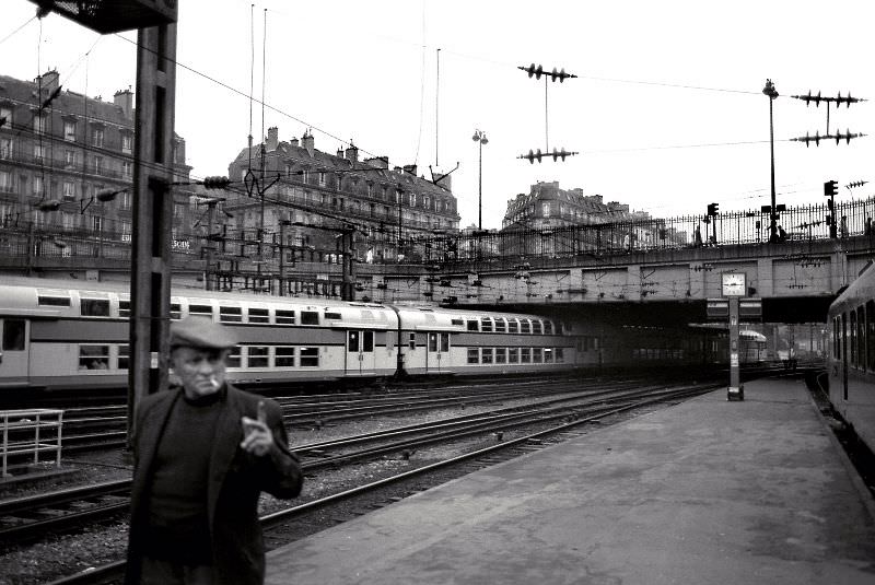 #30 Man smoking cigarette, Paris, 1978