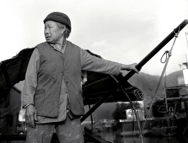 #20 Water taxi driver. Hong Kong, 1987.