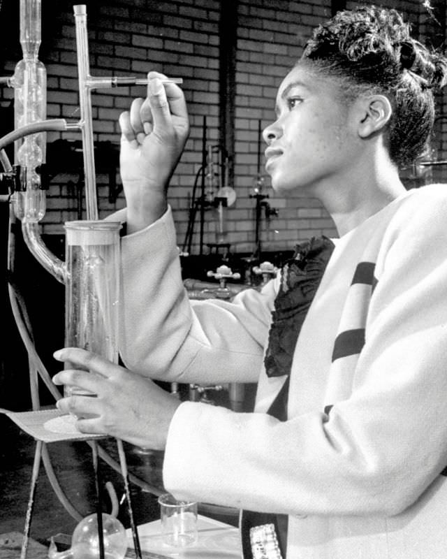 #8 A Howard University student working in the laboratory