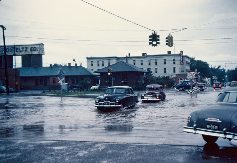 #19 Flooded street, Iron Mountain, Michigan. November 1951