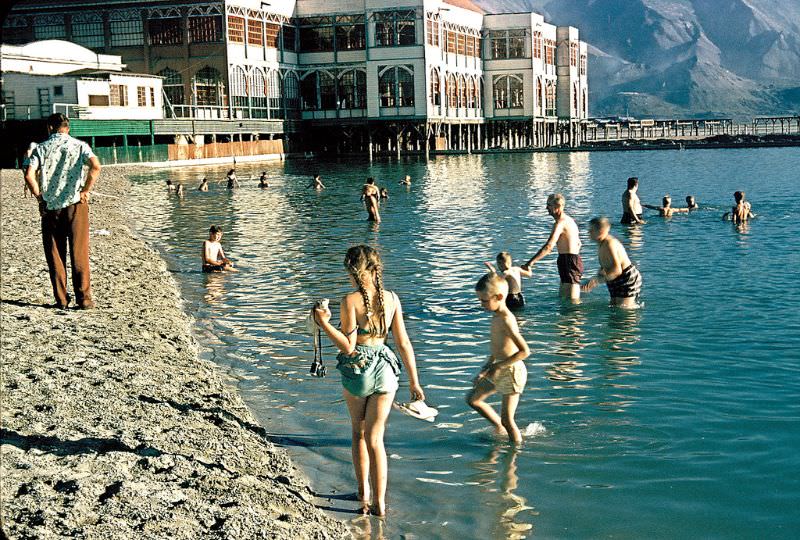 #67 Swimming in the Great Salt Lake at Saltair resort, Utah. July 1956