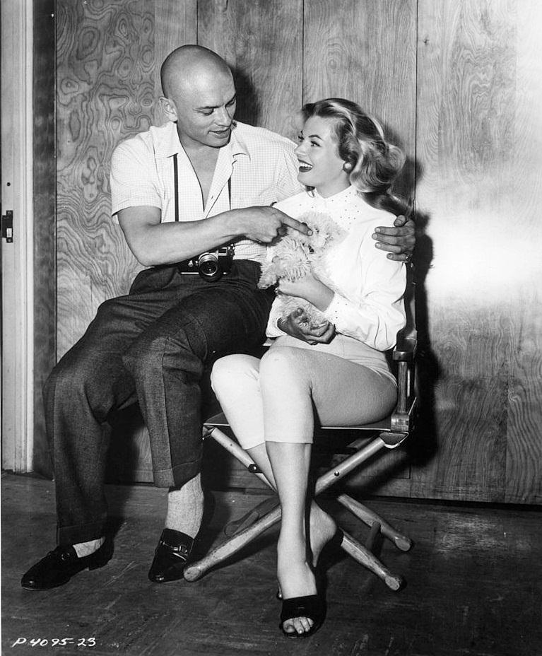 Anita Ekberg with Yul Brynner on set of the film ‘Artists And Models’, 1955.