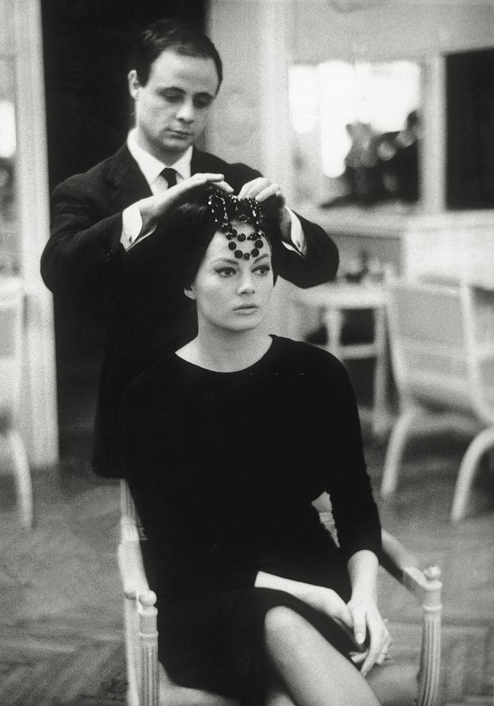 #42 Anita Ekberg tries a hairstyle, 1956.