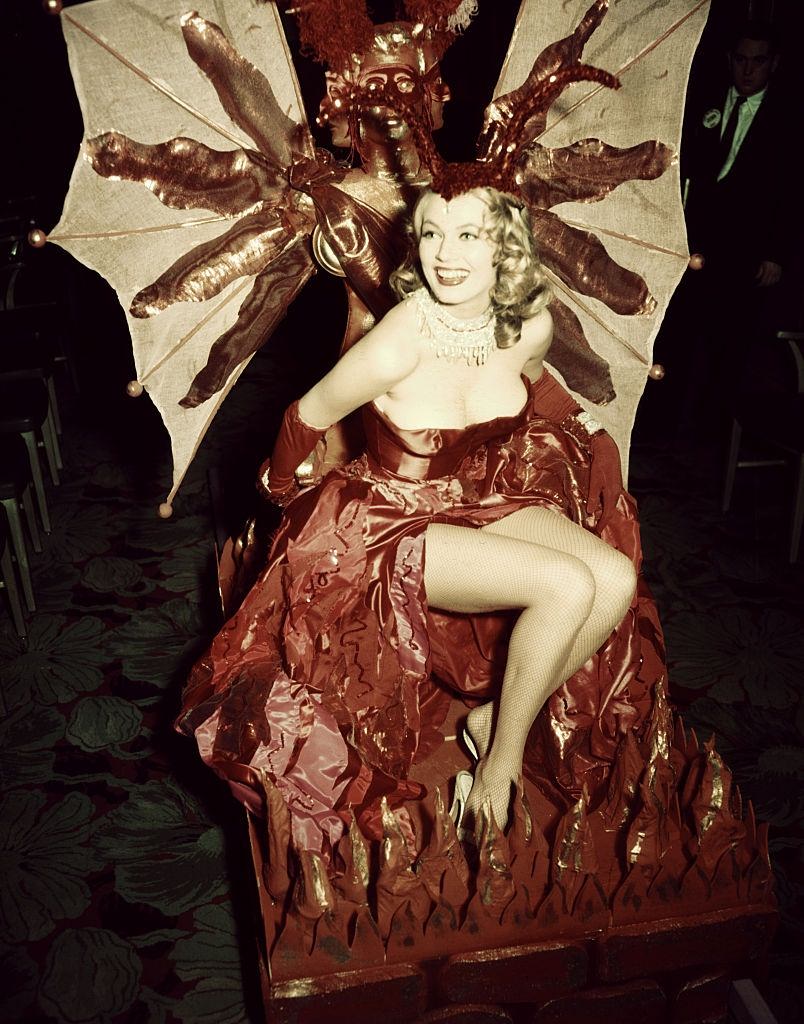 #43 Anita Ekberg in pink costume at Hotel Commodore, 1956.