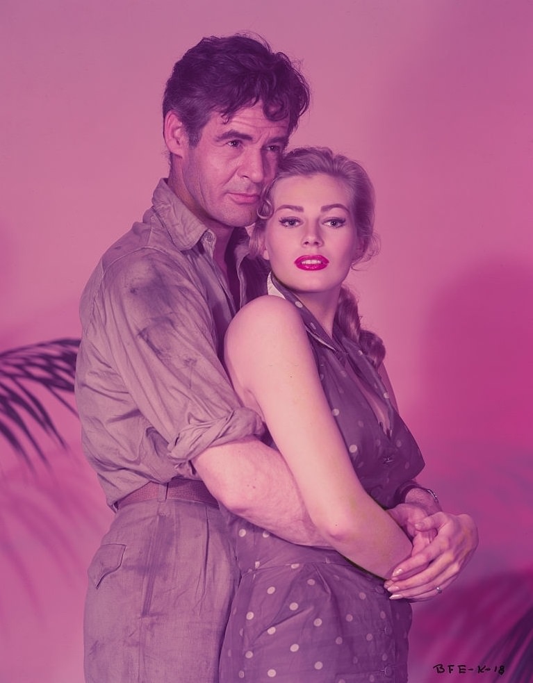 #53 Anita Ekberg with Robret Ryan in Back from Eternity, 1956.
