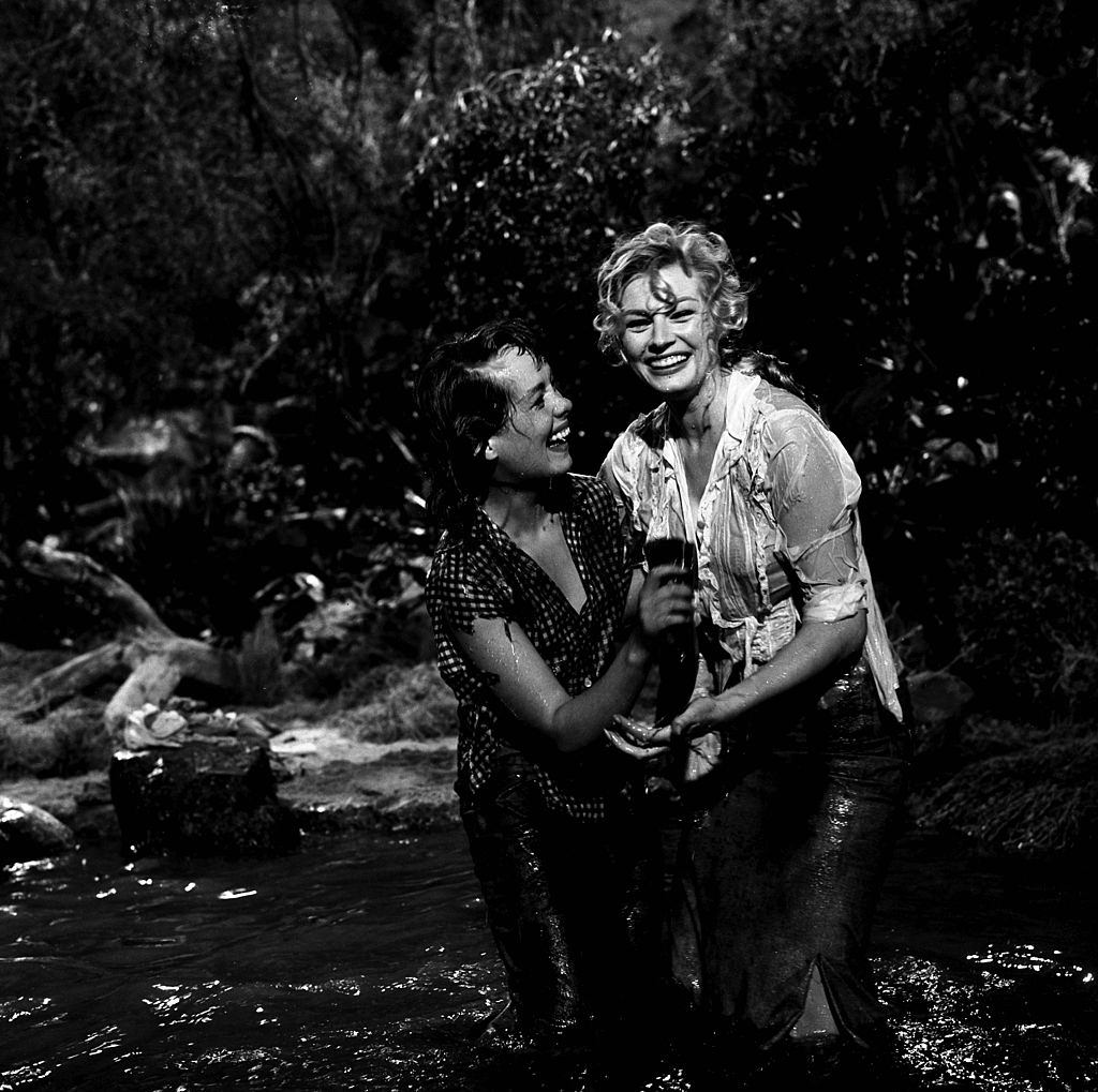 #11 Anita Ekberg with Phyllis Kirk on the set of “Back from Eternity” in Los Angeles, 1956.