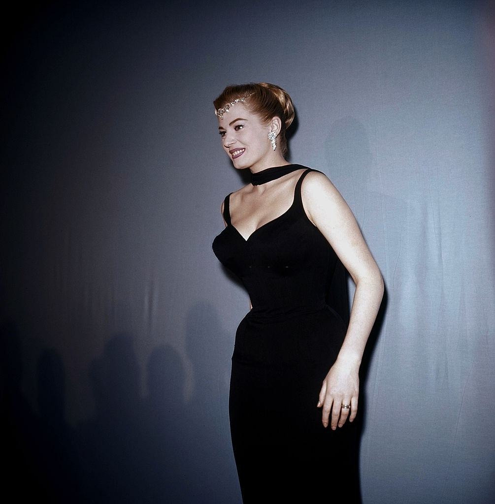 #23 Actress Anita Ekberg attends a party in Los Angeles, California.