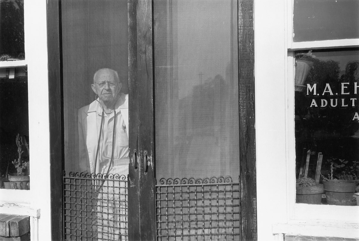 #30 Dr. M. A. Ehrlich in the doorway of his office, 1980 Aug