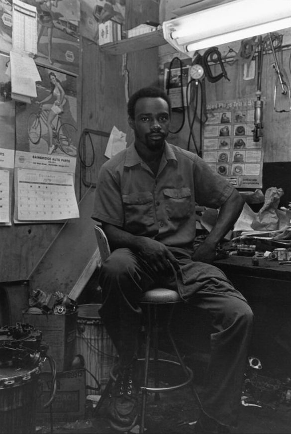 #31 Watt Baldwin, Jr. in his garage, 1980 June