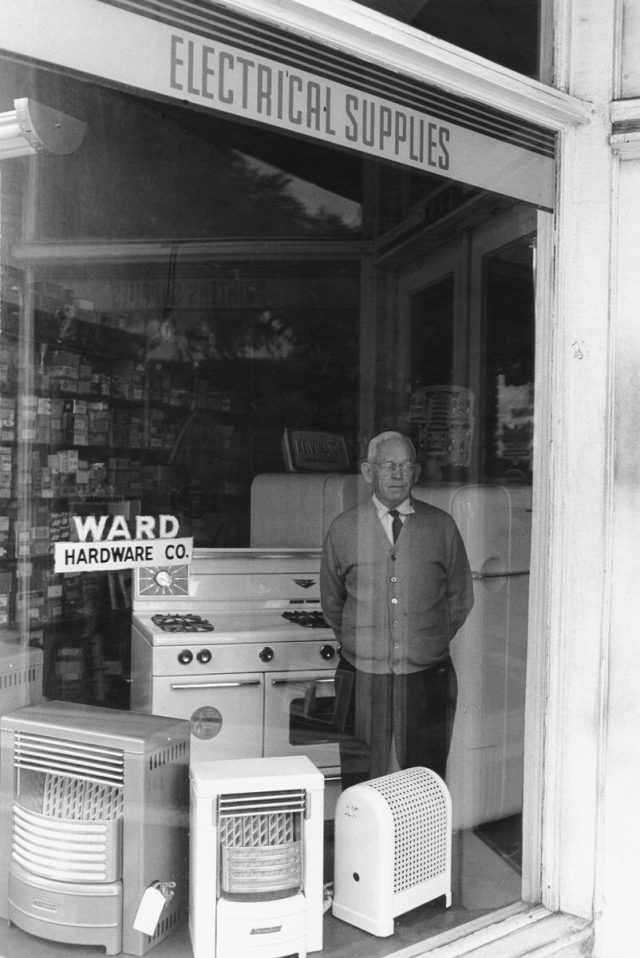 #3 Mr. Ward in the window of his hardware store, 1968