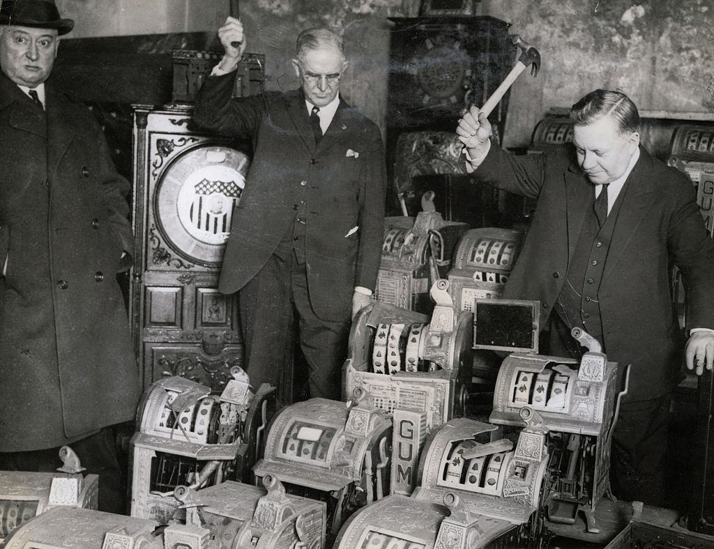 #11 Agents Destroying Slot Machines in Chicago, 1910s.