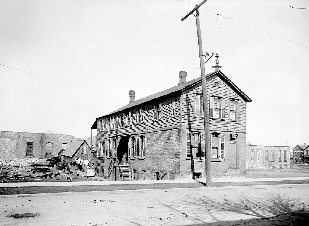 #36 Exterior view of a building at 6657 S. State Street which operated a counterfeit coin operating racket, Chicago, 1911.