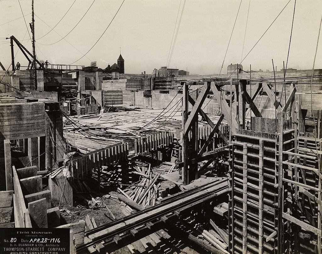 #67 Field Museum construction site of men hauling materials up to outer wall, Chicago, 1916.