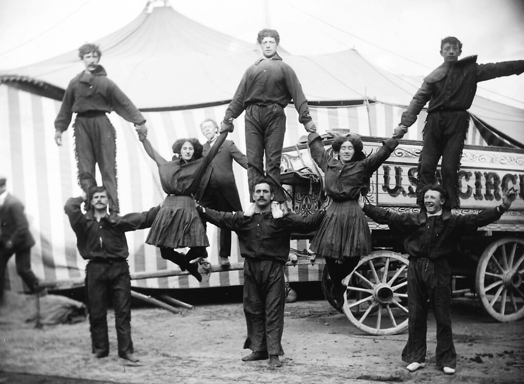 #14 Group of circus performers standing on each other’s shoulders, 1910.